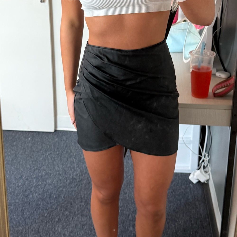 black mini skirt